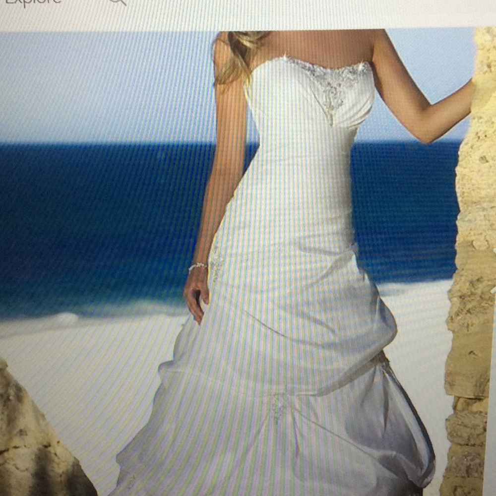 WEDDING GOWN BY DESIGNER ELLA. OPEN TO GOOD OFFERS